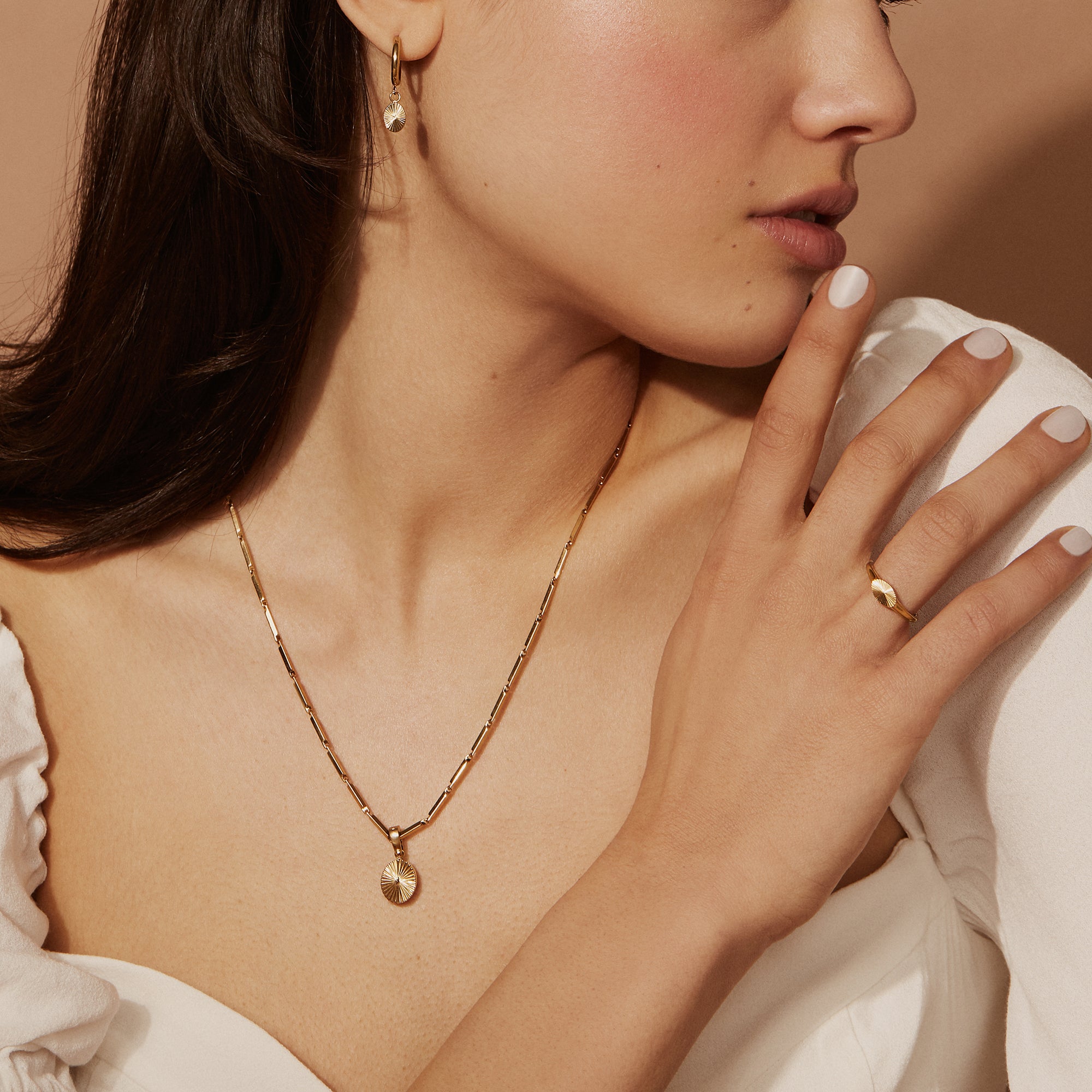 Gold Stainless steel hoop earrings with sun pendant comfortable MIA